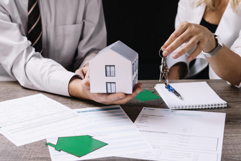 A couple signing a rental lease