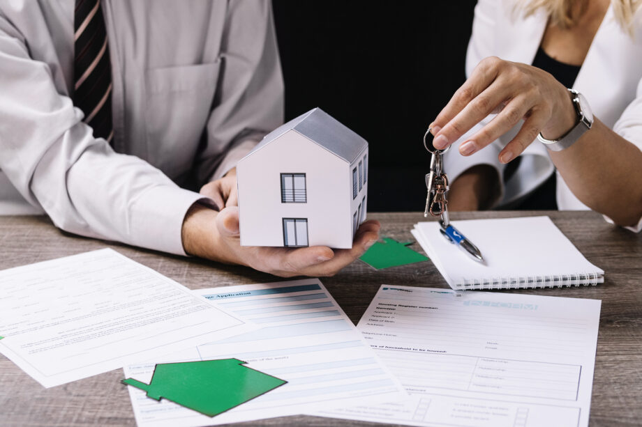 A couple signing a rental lease